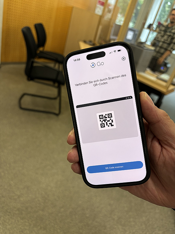 Ein Smartphone auf dem die App zu sehen ist